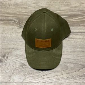 Green kittenish baseball cap